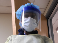 Nurse wearing PPE.